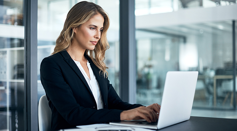 woman working on laptop in office