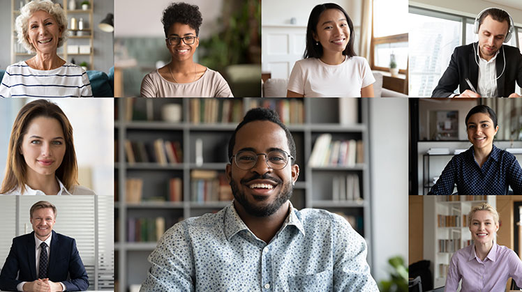 Diverse employees collaborating at work