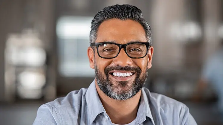 Man wearing glasses smiling